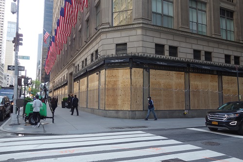 Saks Fifth Avenue covered with plywood and razor wire amid protests in NYC