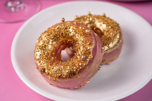 Moxy Times Square Hotel Goes Pink for the Holidays, Bling Donuts